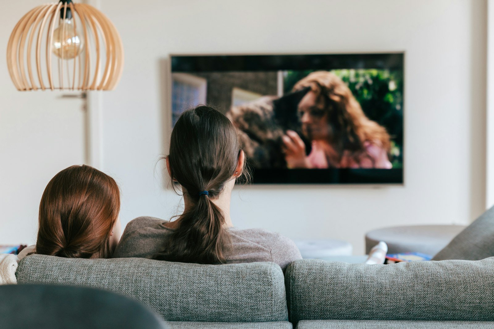 People watching TV in a living room