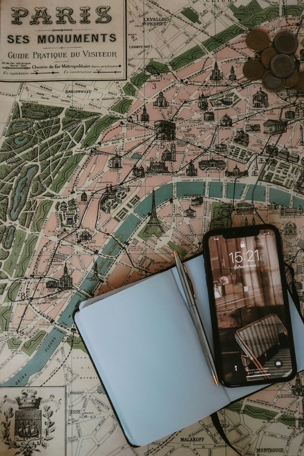 Smartphone and a city map while travelling