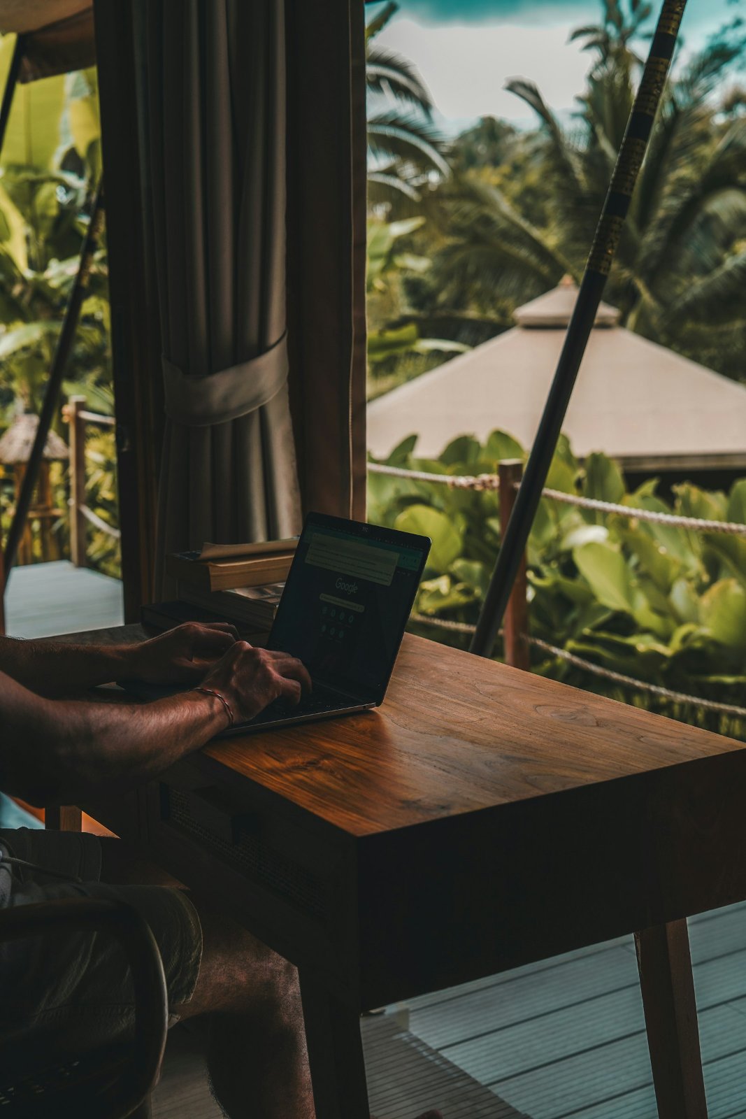 Laptop on a terrace table at a holiday stay